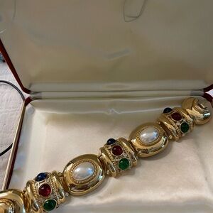 Possible Givenchy gold tone Bracelet with Pearlescent jewel Cabochons glass